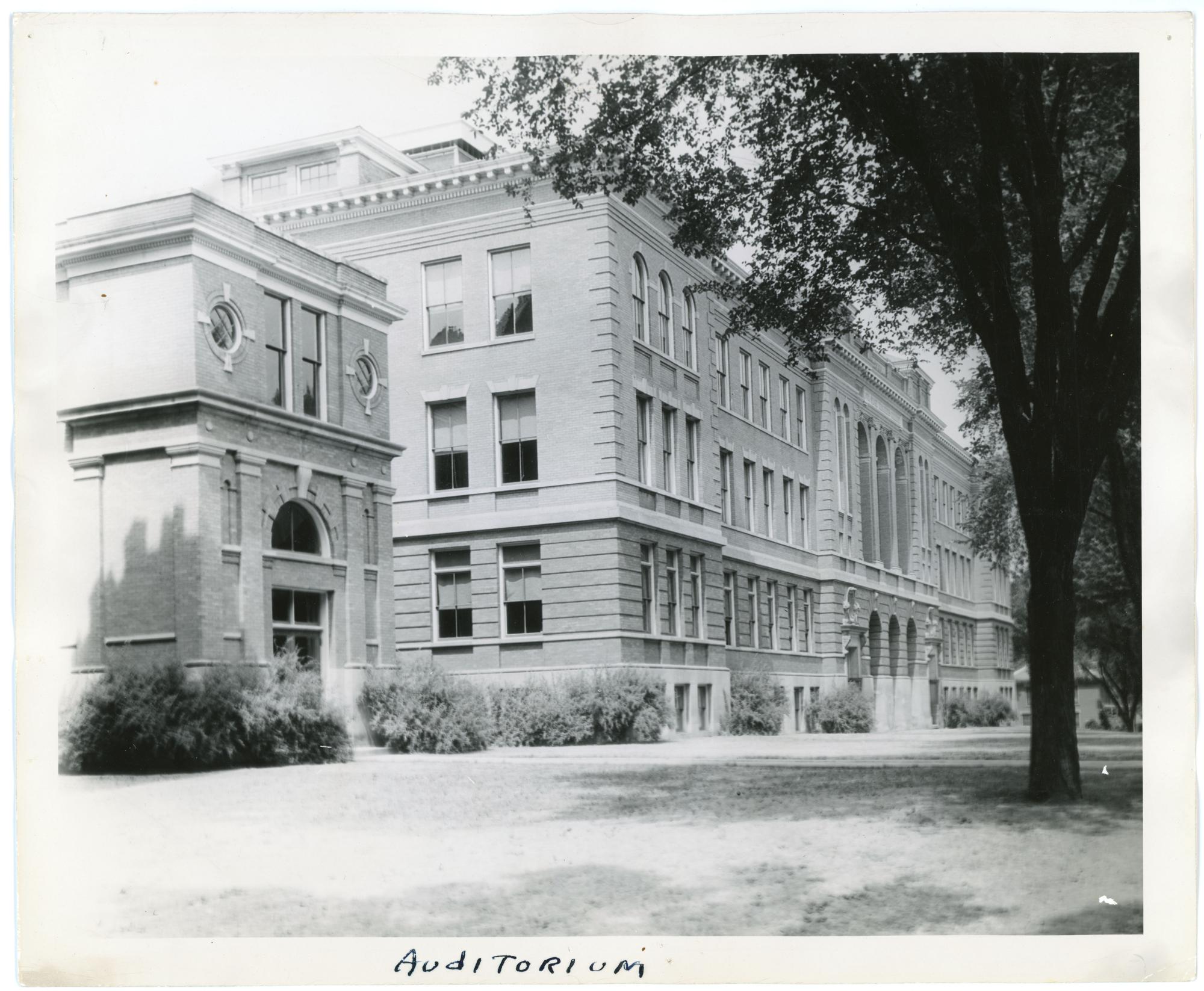 Photograph of Lang Hall with the Crossroads to the left