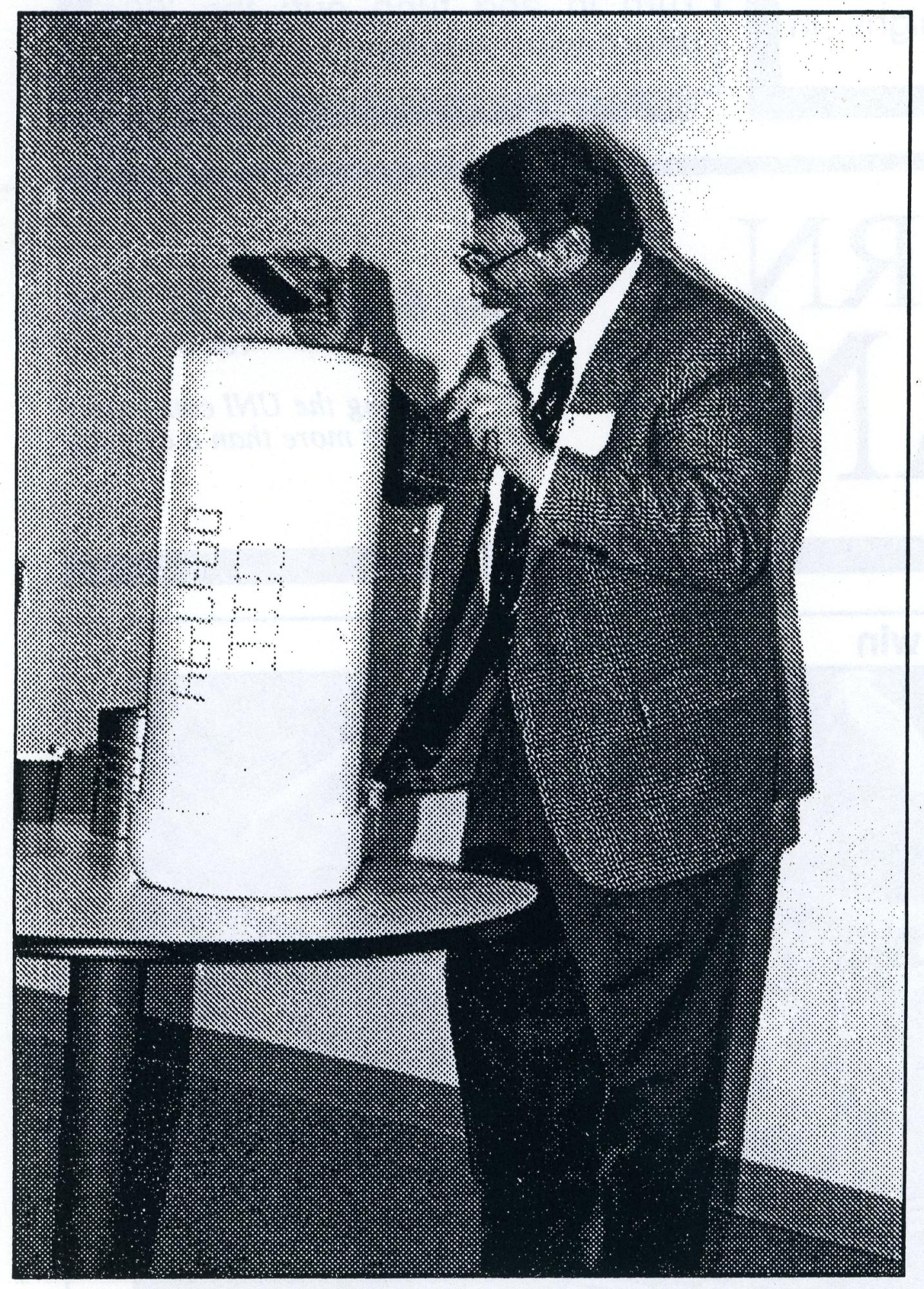 Dean Gerald Intemann sealing the time capsule at the CEEE dedication