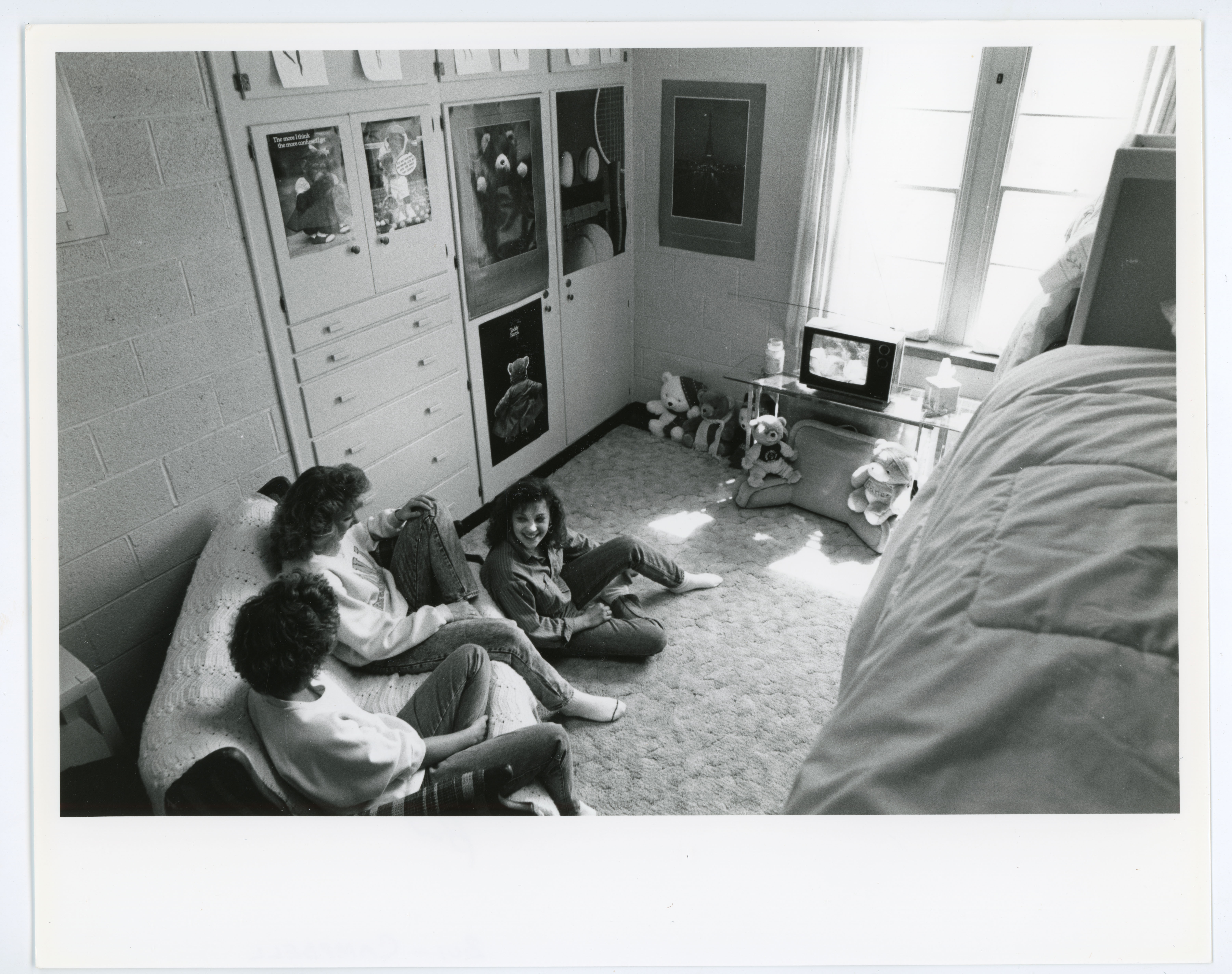Three women in dorm room