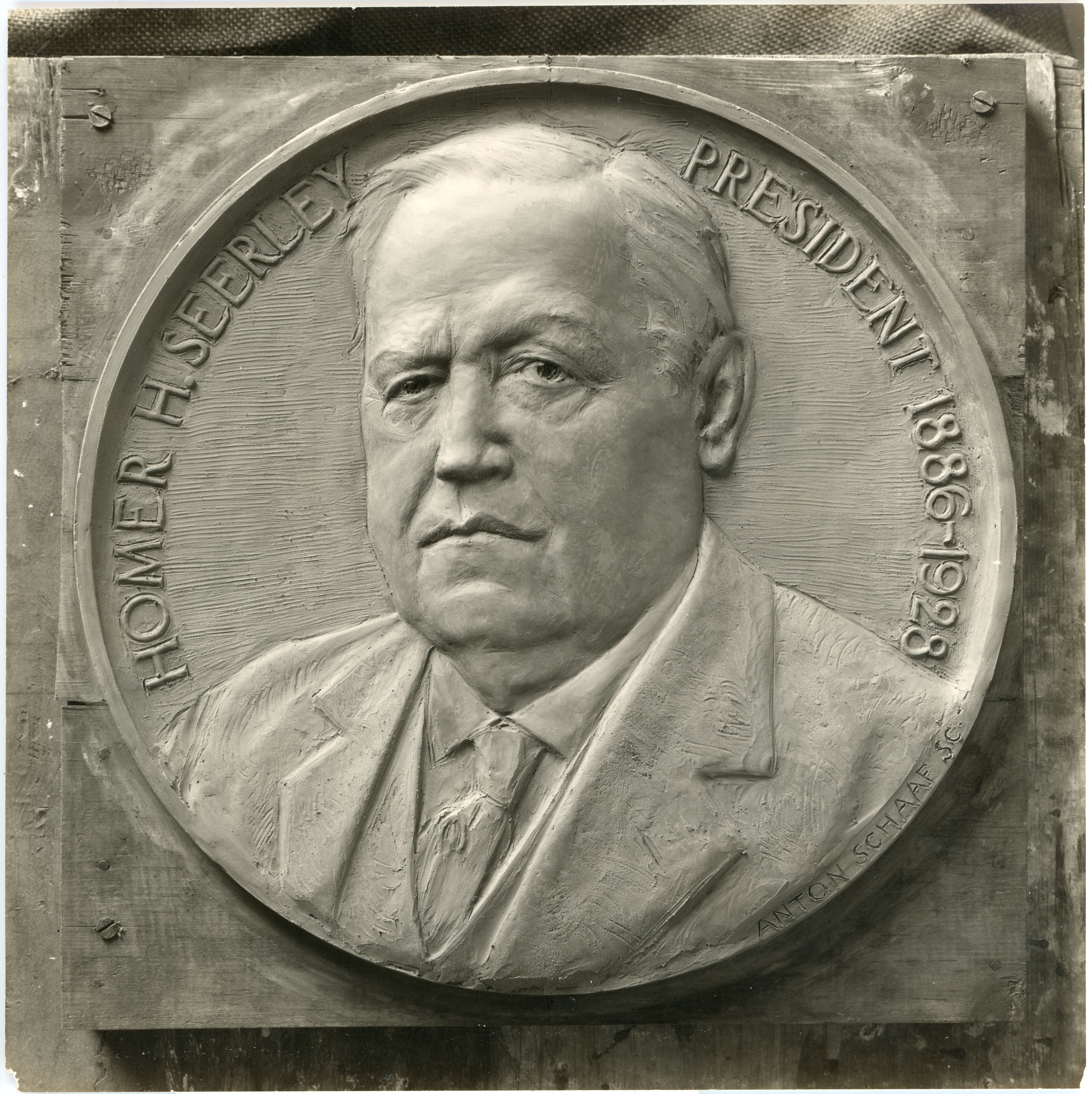 Bronze medallion with Seerley's portrait and words Homer H. Seerley President 1886-1928