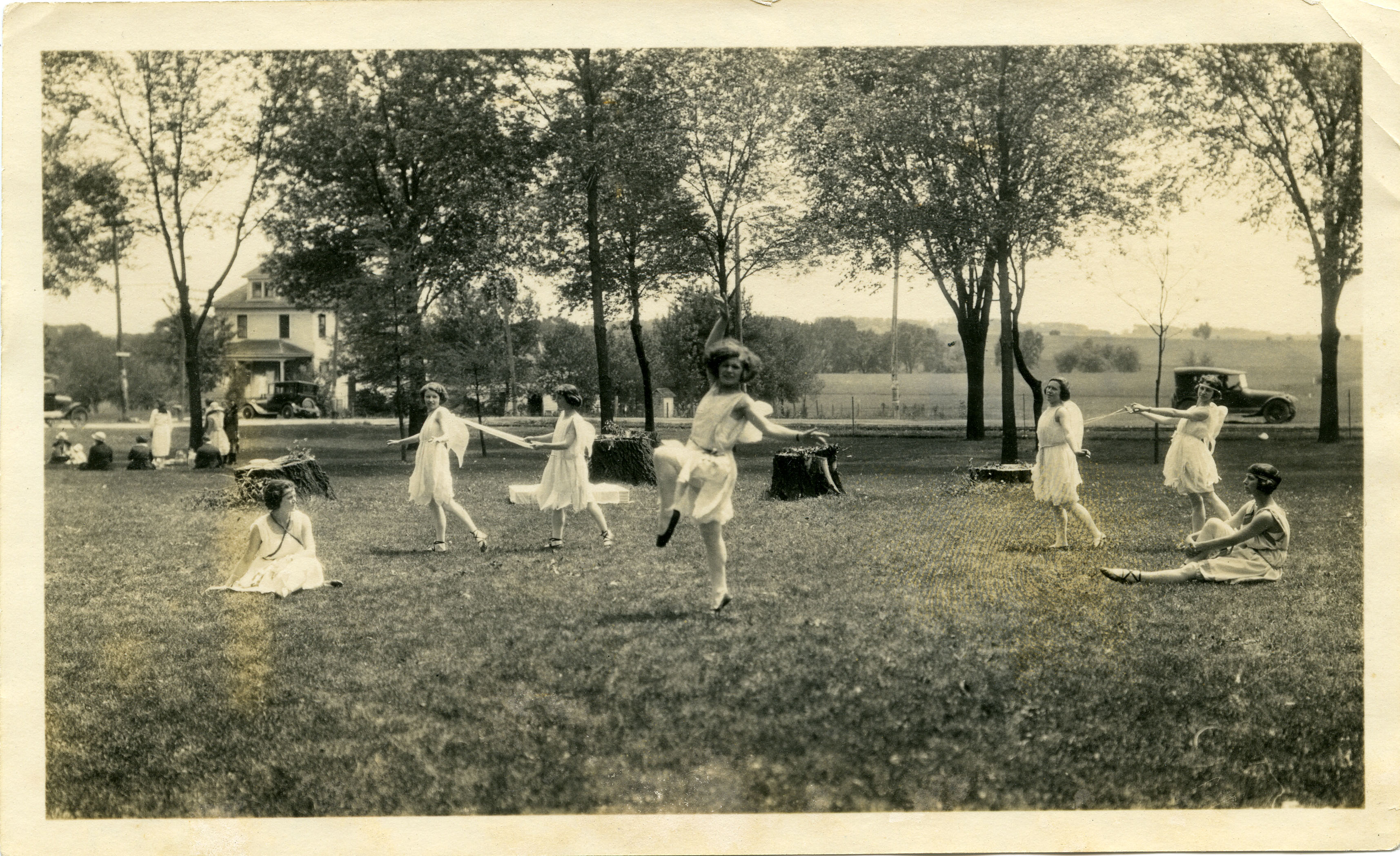 Women dancing in fairy costumes