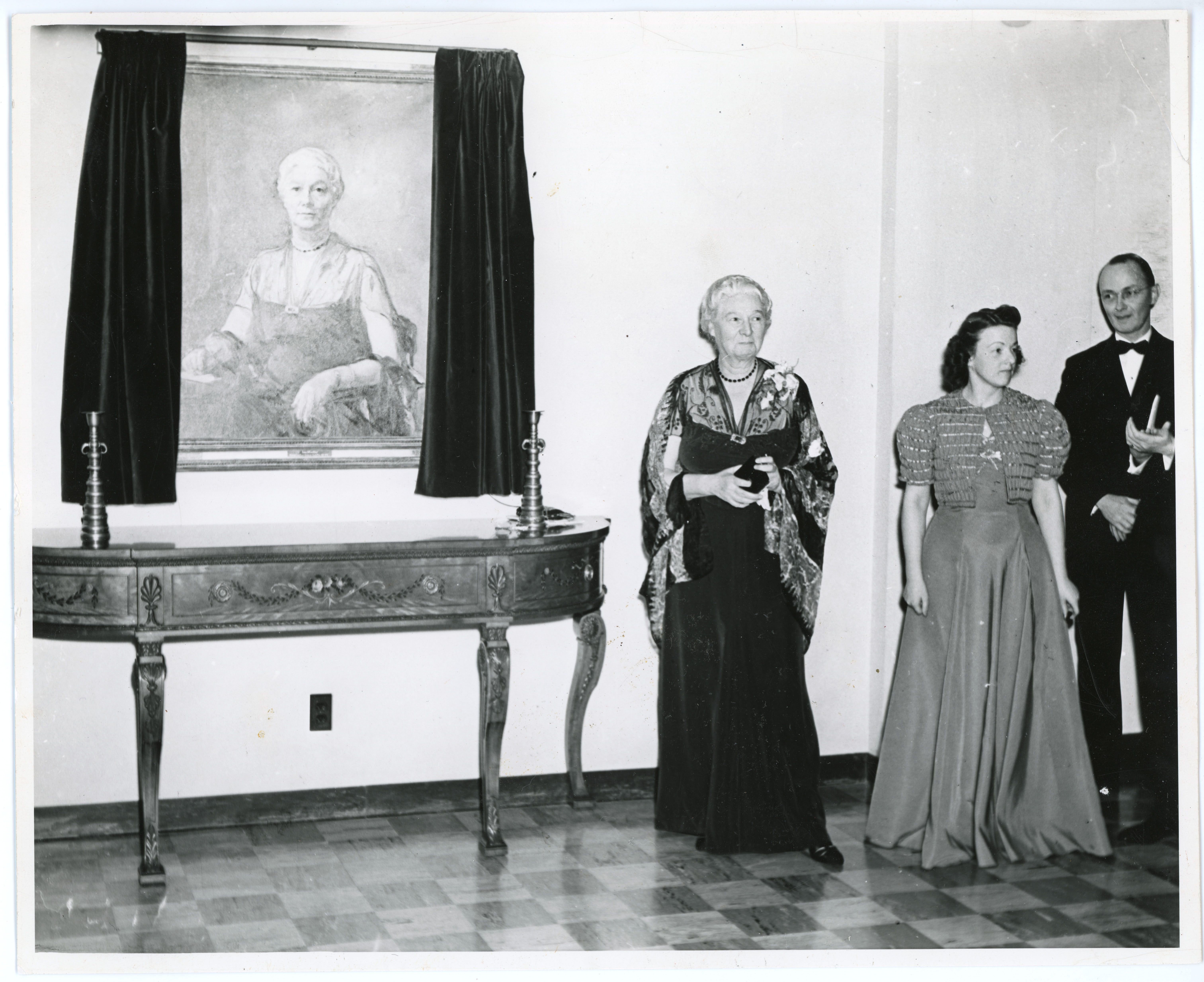 Anna B. Lawther next to her portrait at Lawther Hall dedication ceremony