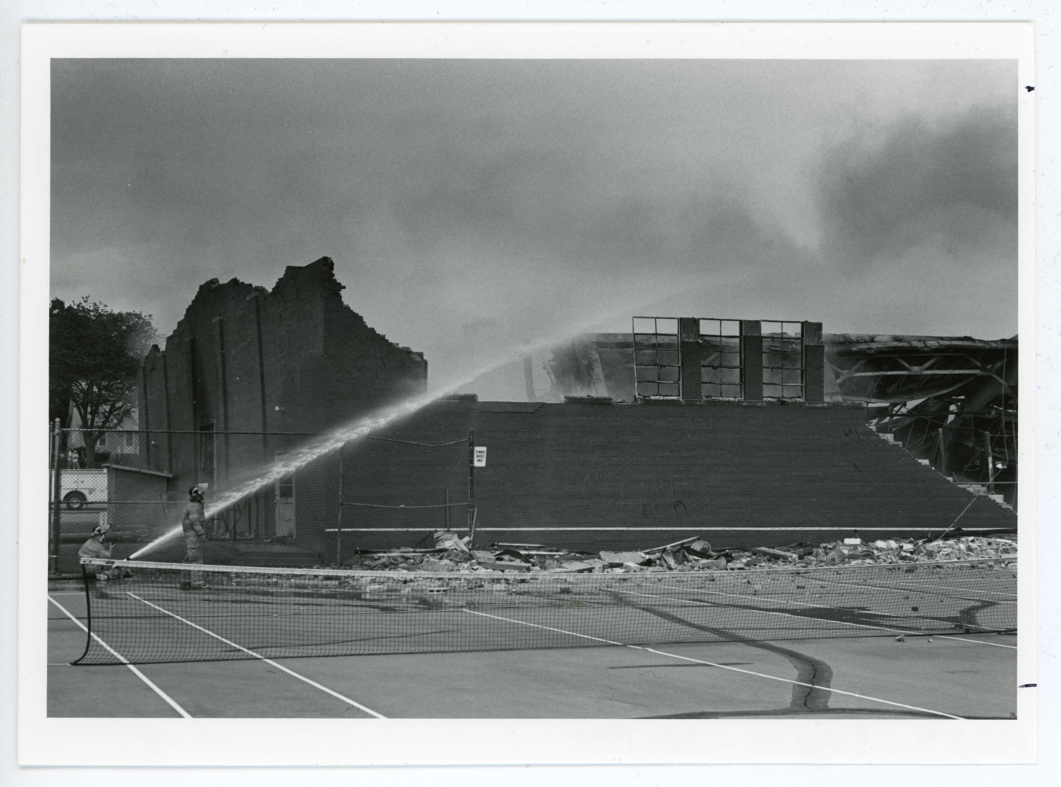 Firefighters putting out the Nielsen Fieldhouse fire, June 1993