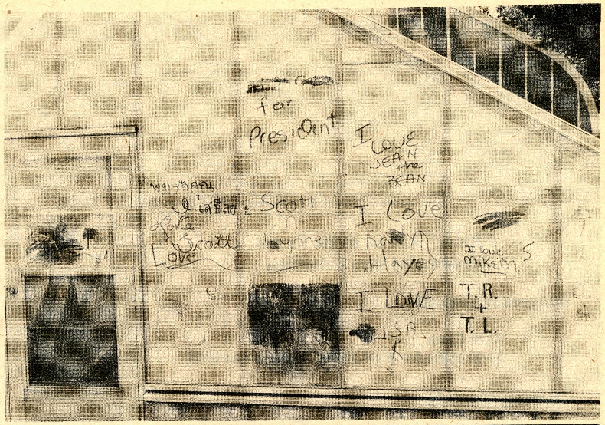 Graffiti on glass panels of the Greenhouse