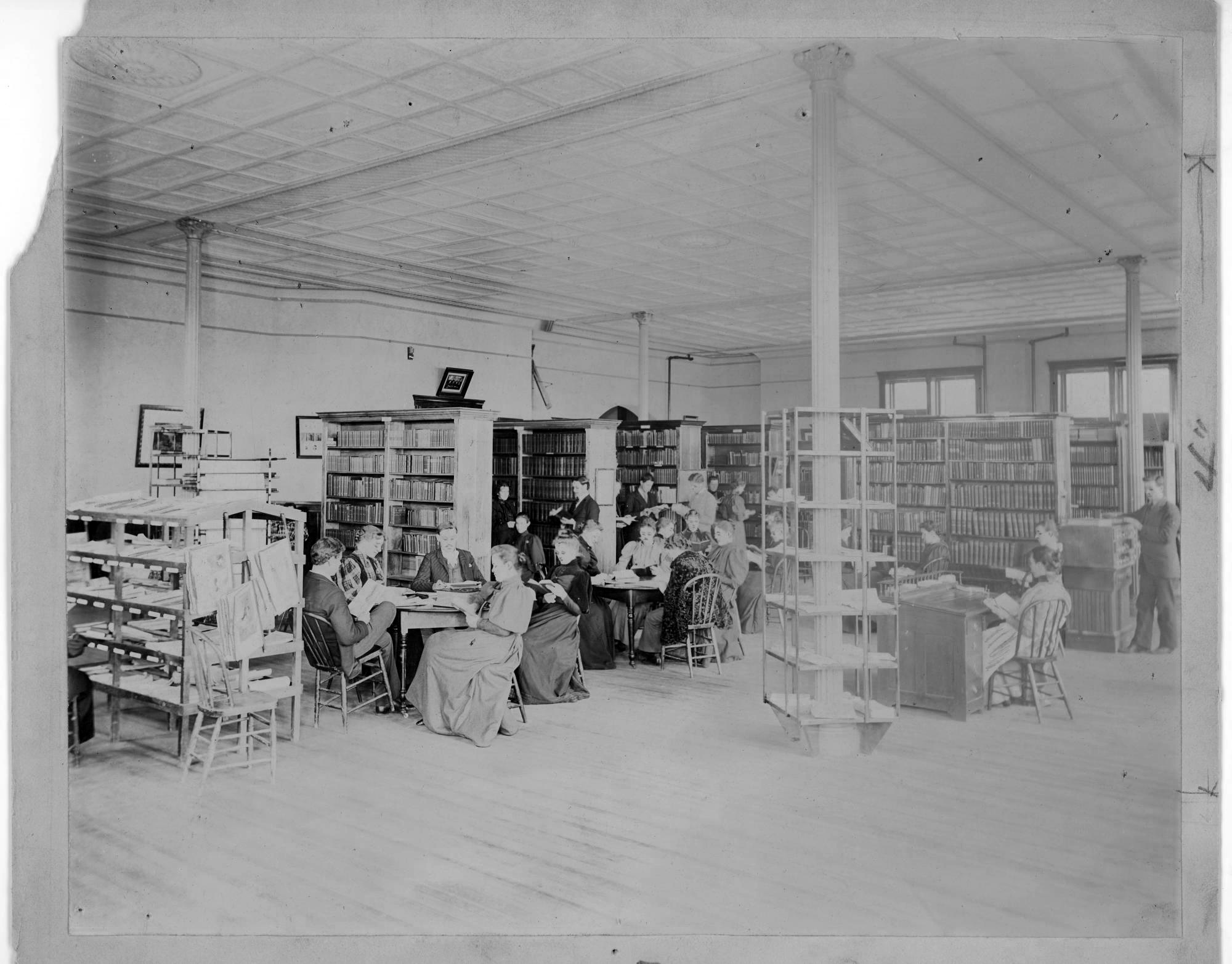 Students sitting in the Old Administration Building library