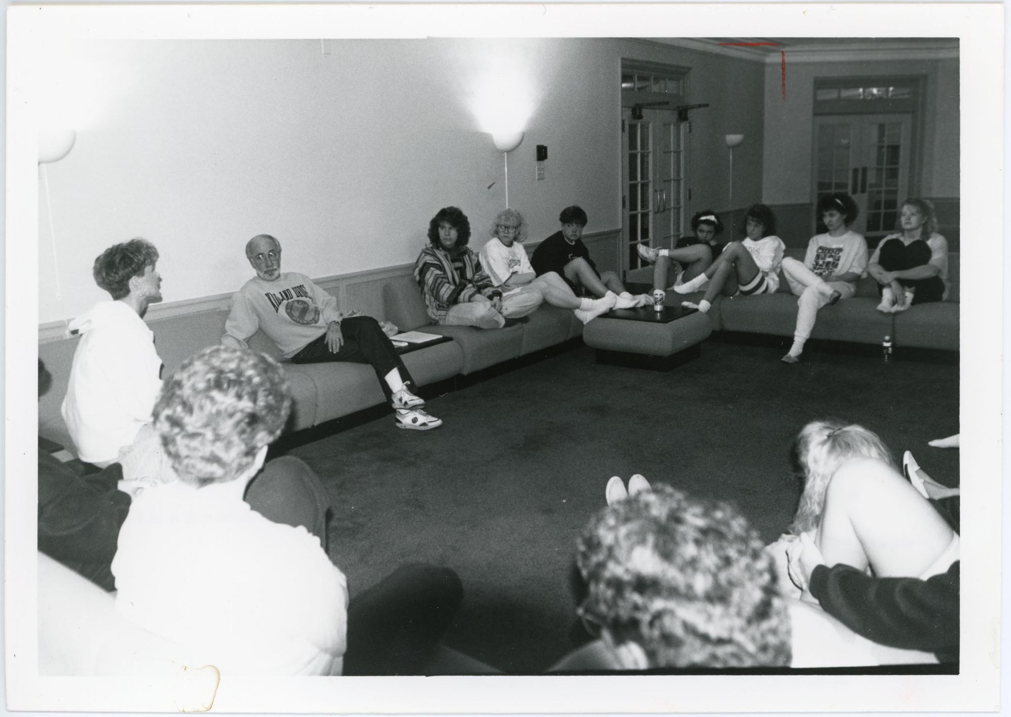 Paul Dunbar speaking to a group of students in a Lawther Hall lounge