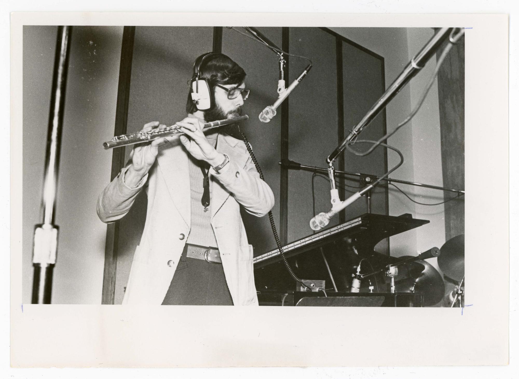 Professor Rick Lawn playing flute during CAC dedication activities