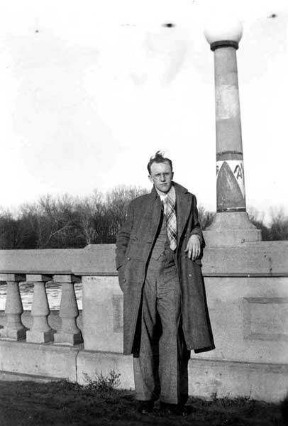 Randall Bebb on a bridge over the Cedar River.