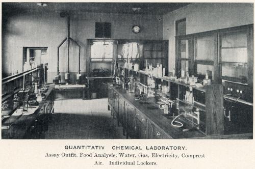 Photograph of quantitative chemical laboratory with equipment set up on counters