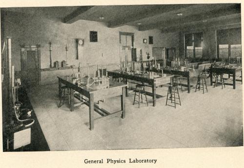 Photo of General Physics Laboratory, there are several tables with various scientific instruments on them