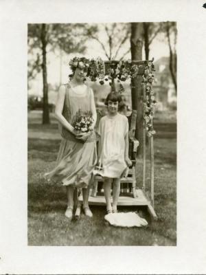 May Day Queen Standing Next to Throne