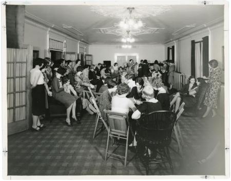 Photograph of students gathering in Bartlett Hall lounge, 1932.