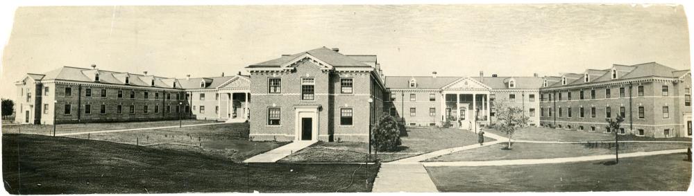 Wide shot exterior photograph of Bartlett Hall, undated.