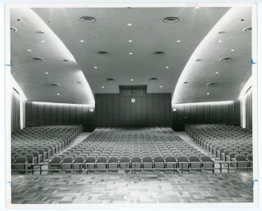 Photo of an empty Russell Hall auditorium taken from the stage