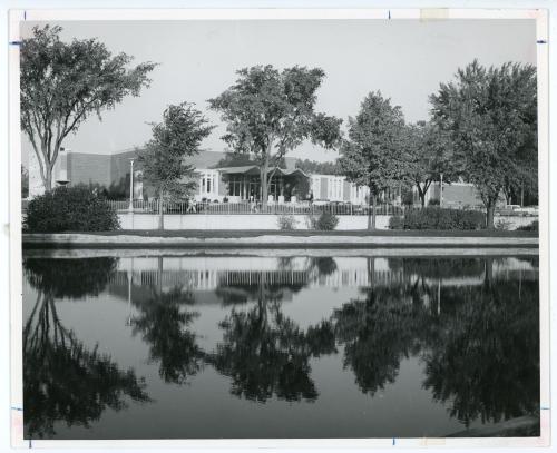 Exterior photo of Russell Hall taken from the other side of the pond