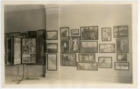 Framed reproductions of American paintings on display in the Library