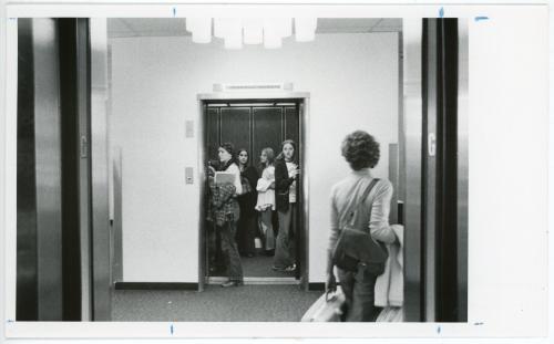 Photo of Towers residents in one of the elevators