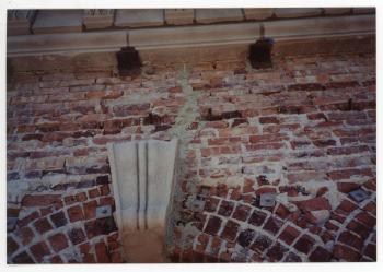 Damage to the brickwork near the top of the Campanile