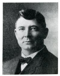 Headshot of James E. Robinson