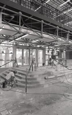 Photograph of construction work being done on the stairs outside of the Kamerick Art Building