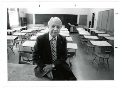 Ross Nelson sitting in a Price Laboratory School classroom
