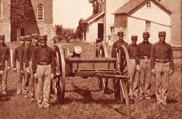 Student battalion posed with cannon