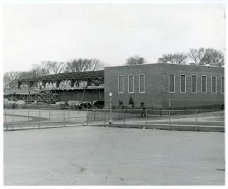 Exterior photo of the original fieldhouse for the Price Laboratory School