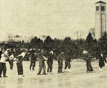 Several people ice skating on Prexy's Pond