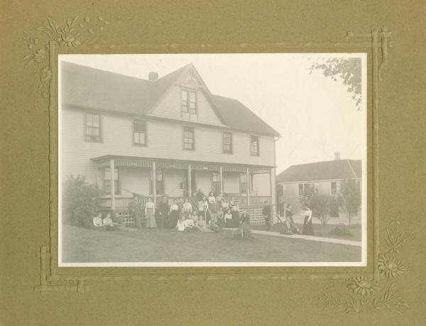 Group photograph of Rownd Hall residents outside of the building