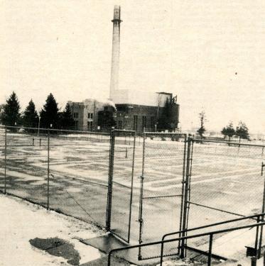 Old UNI tennis courts, the old Power Plant is visible in the background