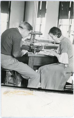 Photograph of two students working in one of the science labs