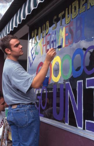 UNI-GLO painting windows for homecoming, from the University of Northern Iowa Photo Collection, #23, University Archive, Rod Library, University of Northern Iowa.
