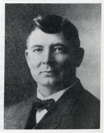 Headshot of James E. Robinson