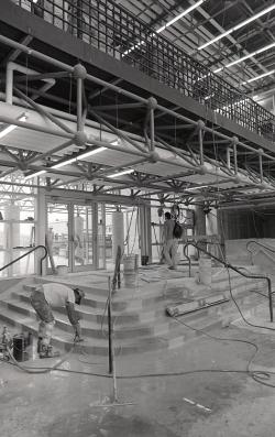 Photograph of construction work being done on the stairs outside of the Kamerick Art Building