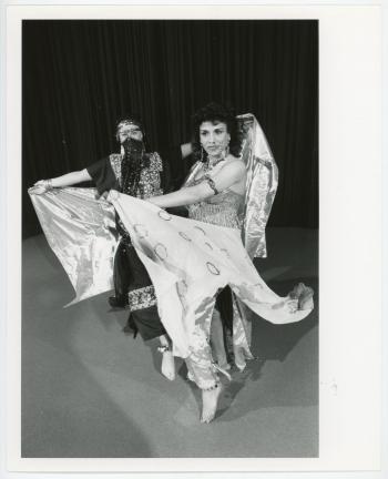 Two women dressed in traditional Indian dresswear.