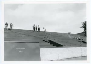 Several people preparing the new stadium for the first game