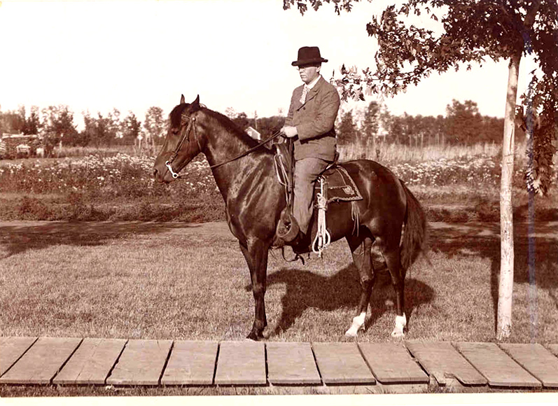 Frank Merchant astride his horse