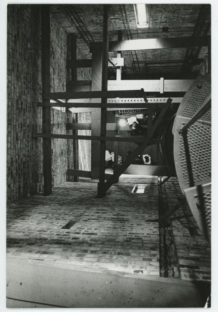 Top-down look at interior of Campanile and person playing carillon