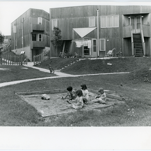 Children playing in the Hillside Courts sandbox