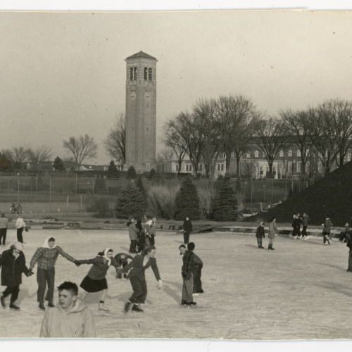 Large group of students skating on Prexy's Pond