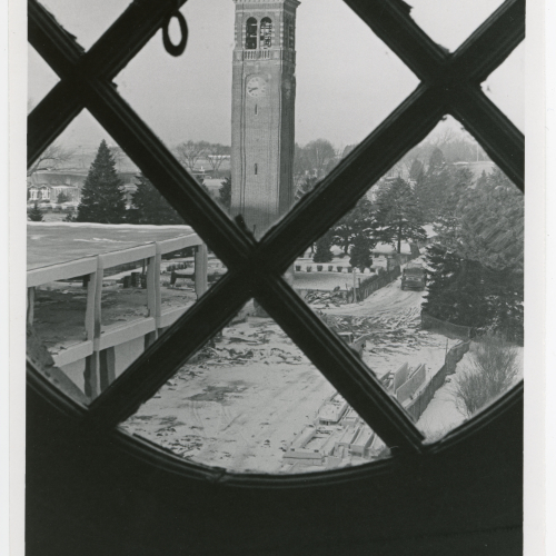 Shot from high window of a building, Rod Library under construction and Campanile with snow