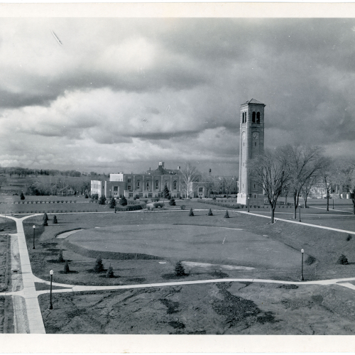 Landscape shot of campus with focus on Campanile and West Gym