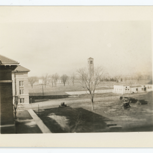 View of campus from high up building, focused on Campanile and West Gym