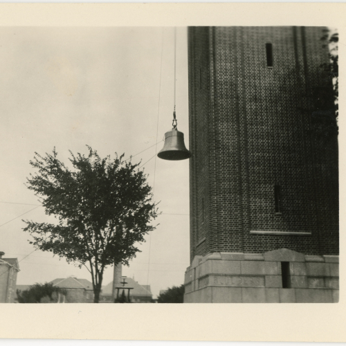 Bell being raised up side of Campanile