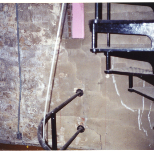 Moisture damage near spiral stairs in Campanile