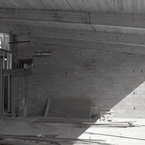 Wooden framing and concrete blocks inside building under construction