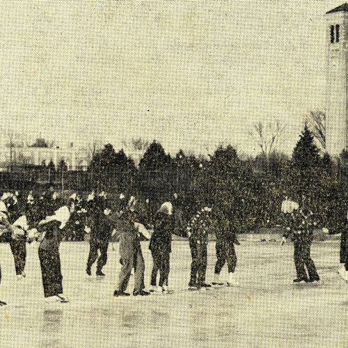 Several students ice skating on Prexy's Pond