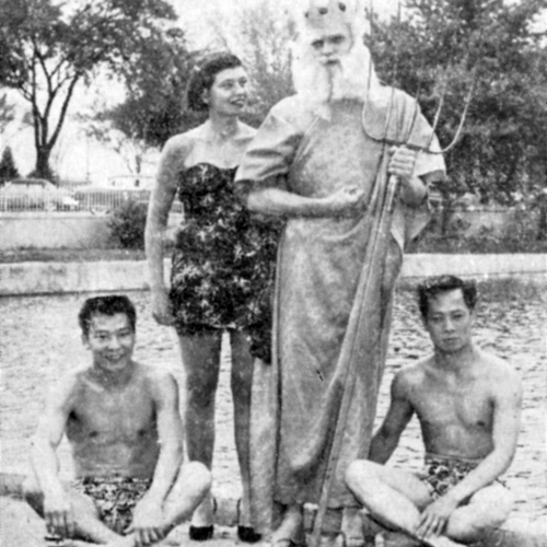 Queen Beth, King Neptune, and attendants Jerry Nishimori and Paul Yap